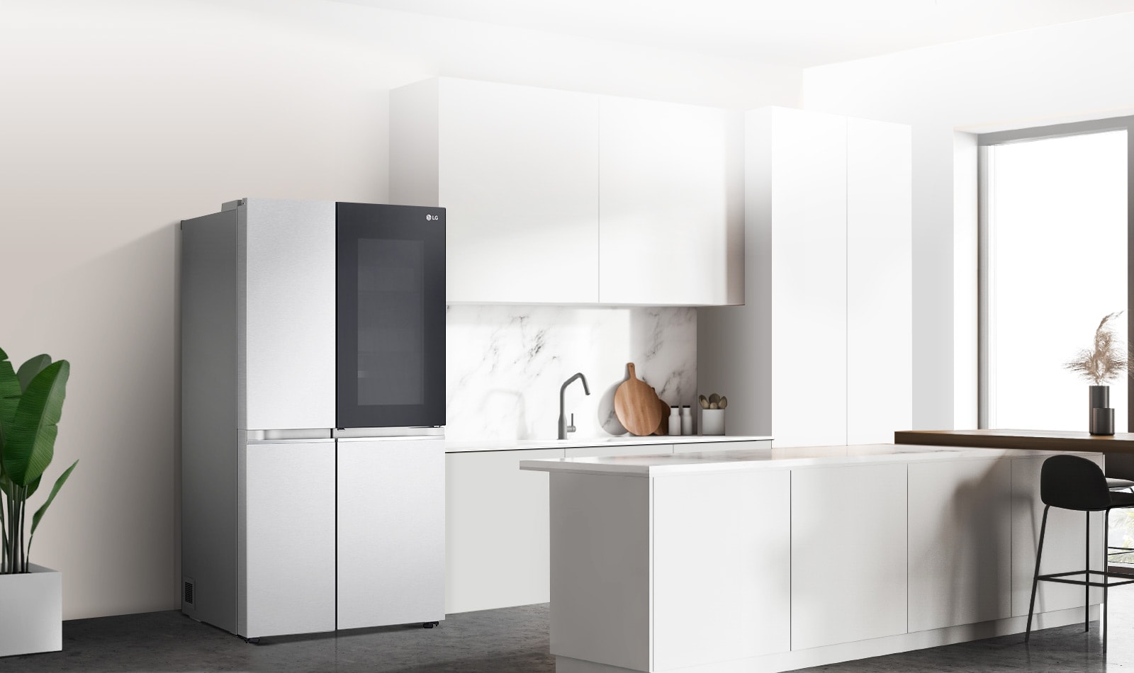 A side view of a kitchen with a black InstaView refrigerator installed.