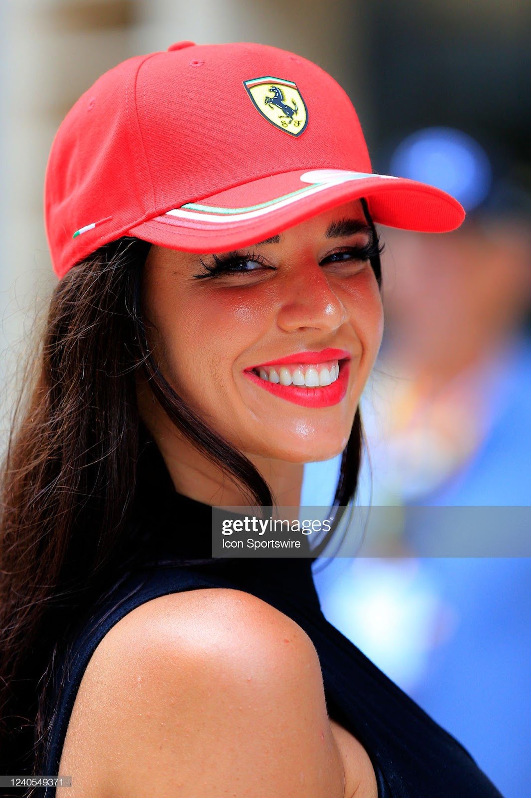 D:\Documenti\posts\posts\Miami\New folder\donne\ferrari-fan-smiles-for-the-camera-prior-to-the-first-running-of-the-picture-id1240549371.jpg