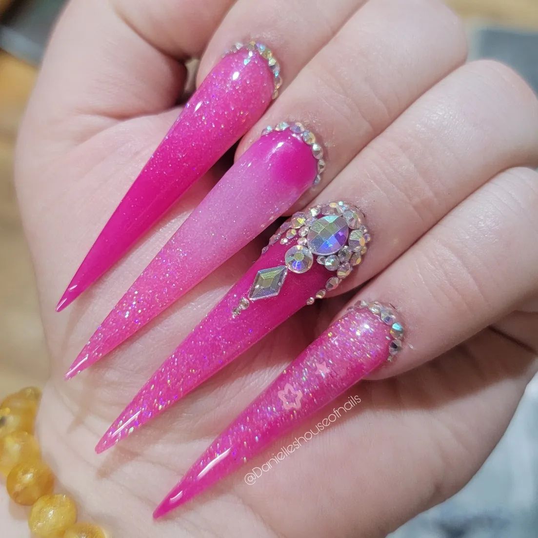 Pink Stiletto Nails With Glitter and Gemstones