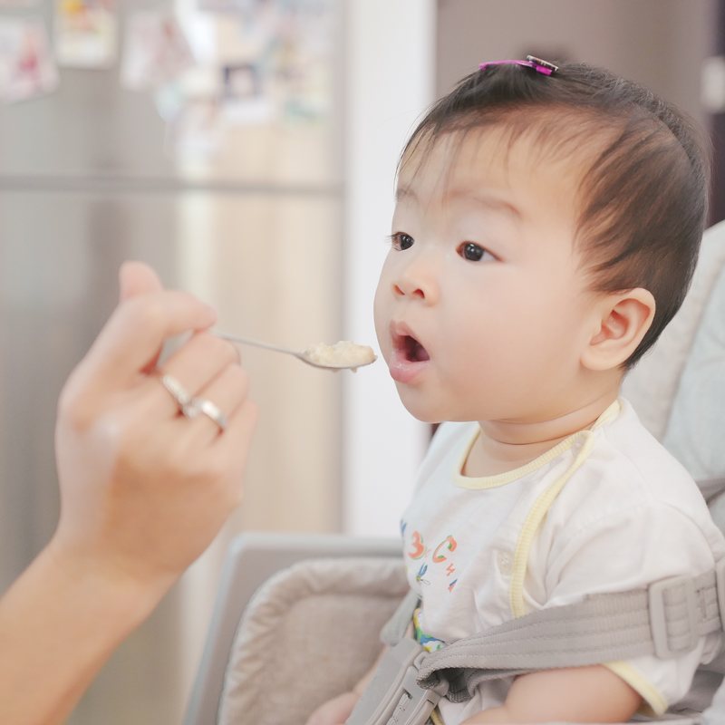 Baby eating baby food