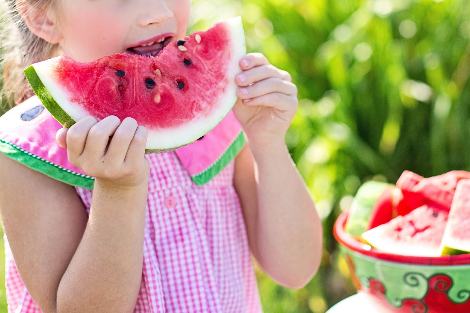 girl eating watermelon outside, summer, hot weather, fresh fruit