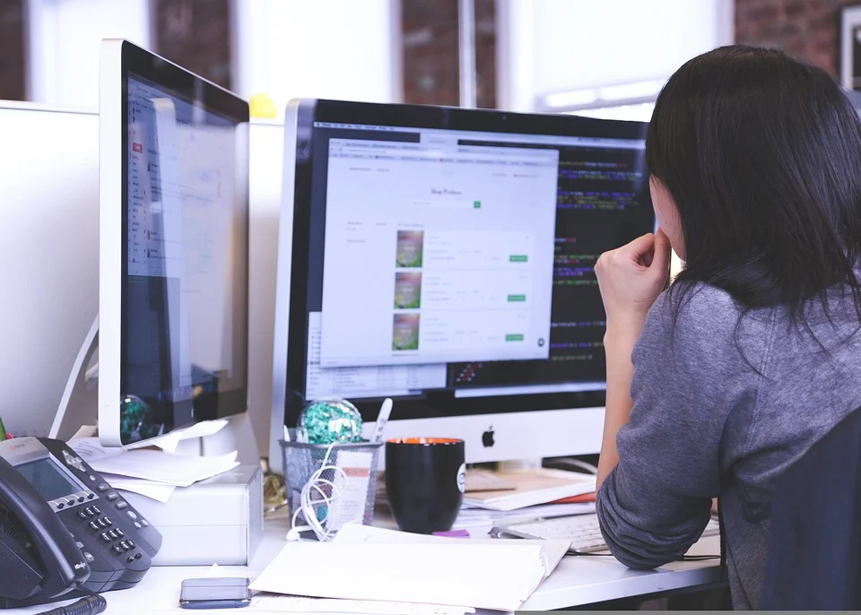 A woman working at a computer