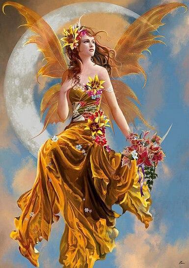 Aine is draped in a yellow dress with flowers adorning it. She has golden fairy wings and she is sitting on a crescent moon. 