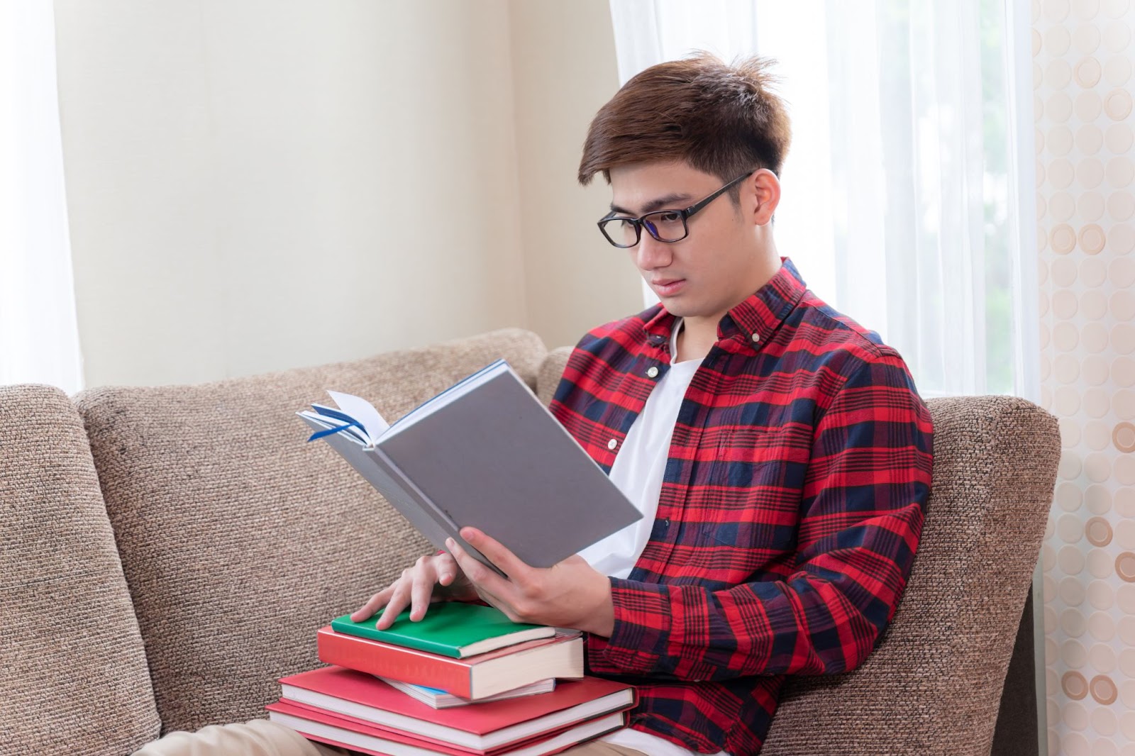 A young man reading poems