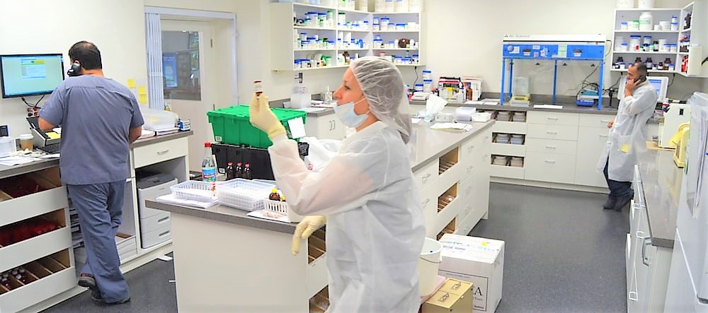 Photo of Fusion RX Compounding Pharmacy Employees performing their duties.