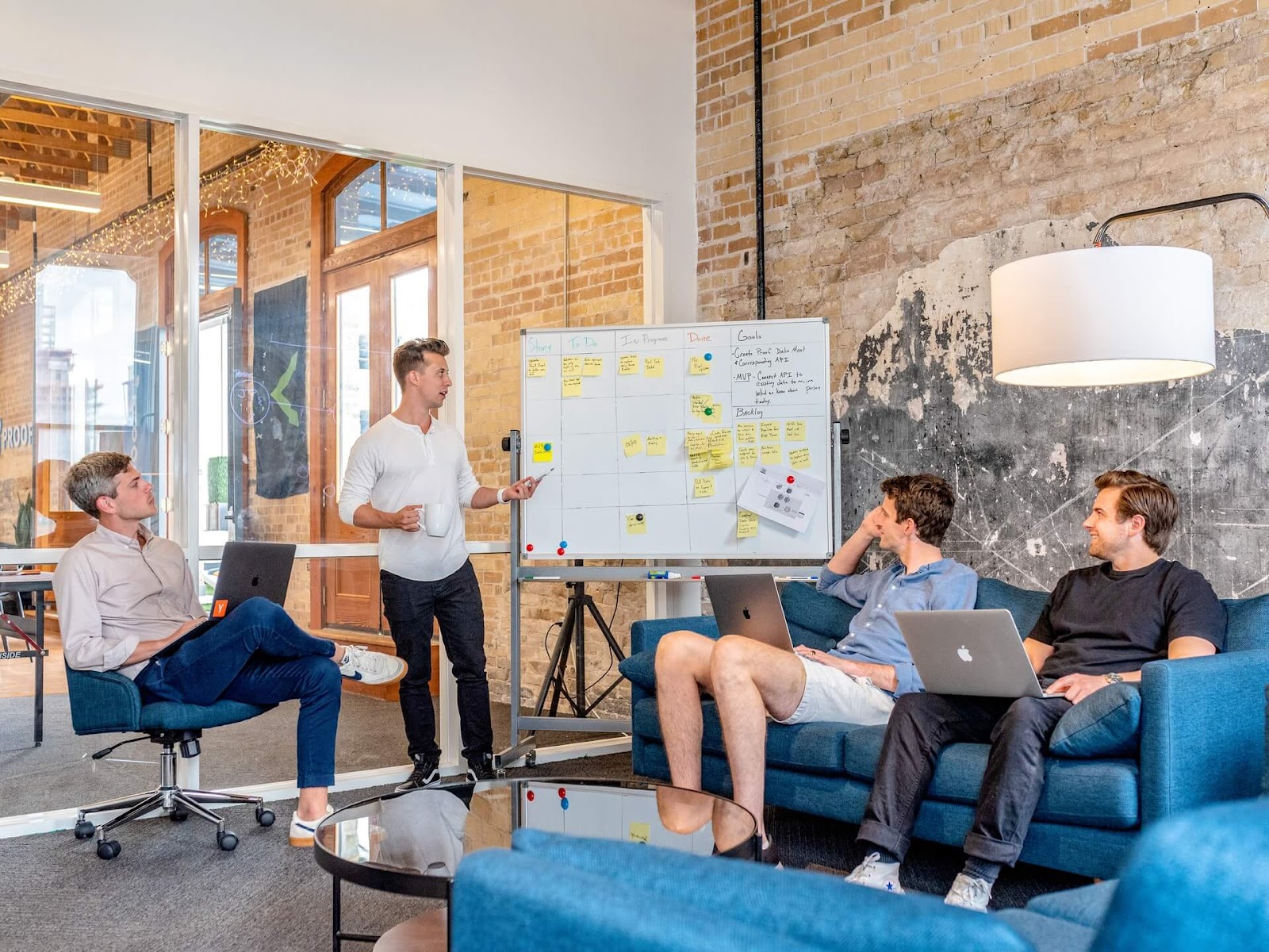 Business meeting, man presenting with whiteboard