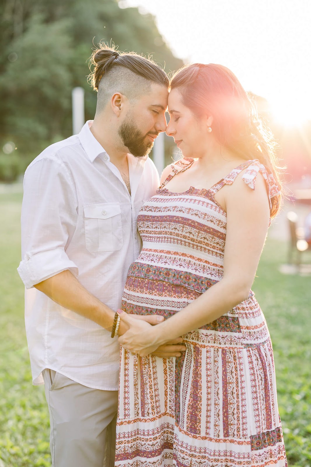 Pregnant couple sunset photography