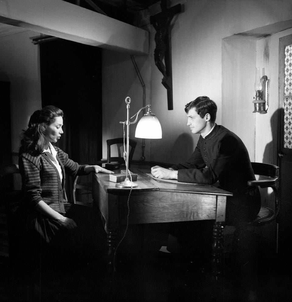 Jean Paul Belmondo and Emmanuelle Riva in Jean-Pierre Melville`s `Léon Morin, Priest`