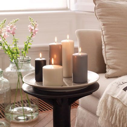 candles on table next to couch