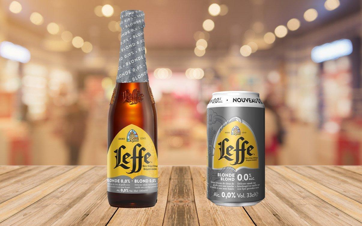 A bottle and a can of Leffe Blond alcohol-free beer