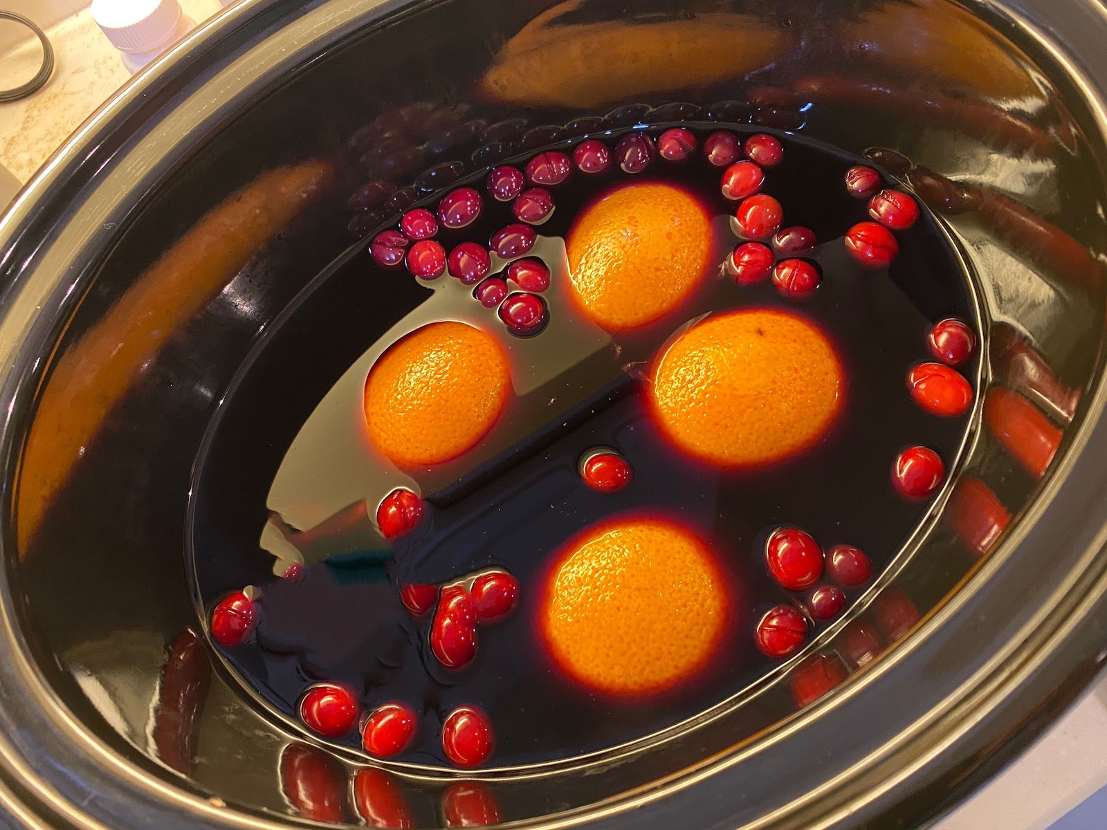 mulled spices cranberries oranges stove cozy home scents