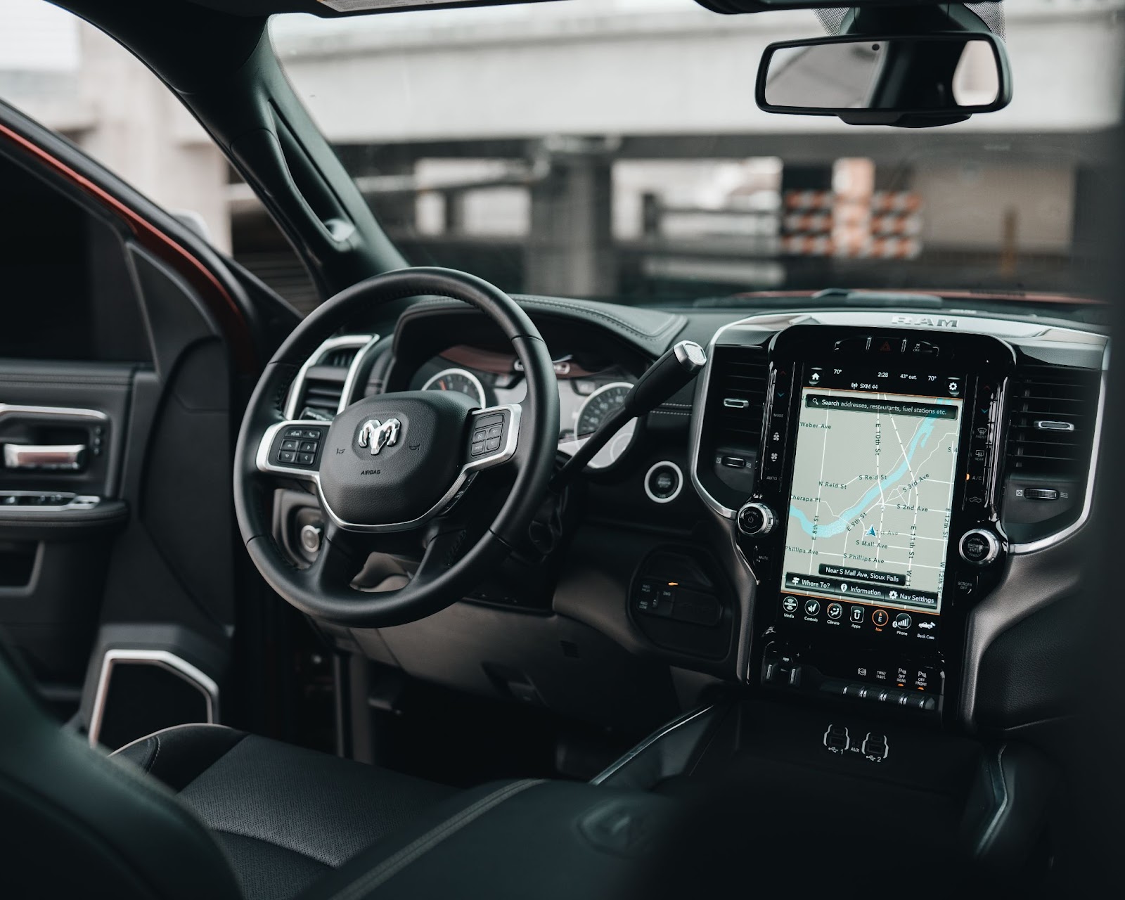 The leather interior of a Dodge RAM driver console