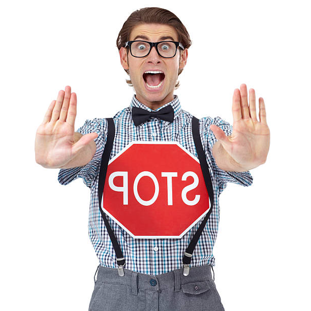 White Oak Security does not own this photo - iStock image of a nerdy man with a backwards stop sign!