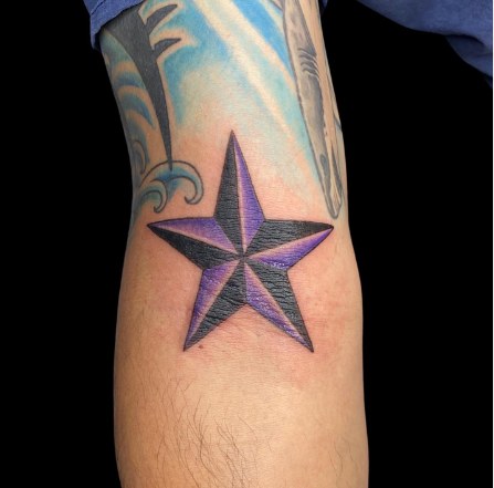 Black And Purple Nautical Star Tattoo