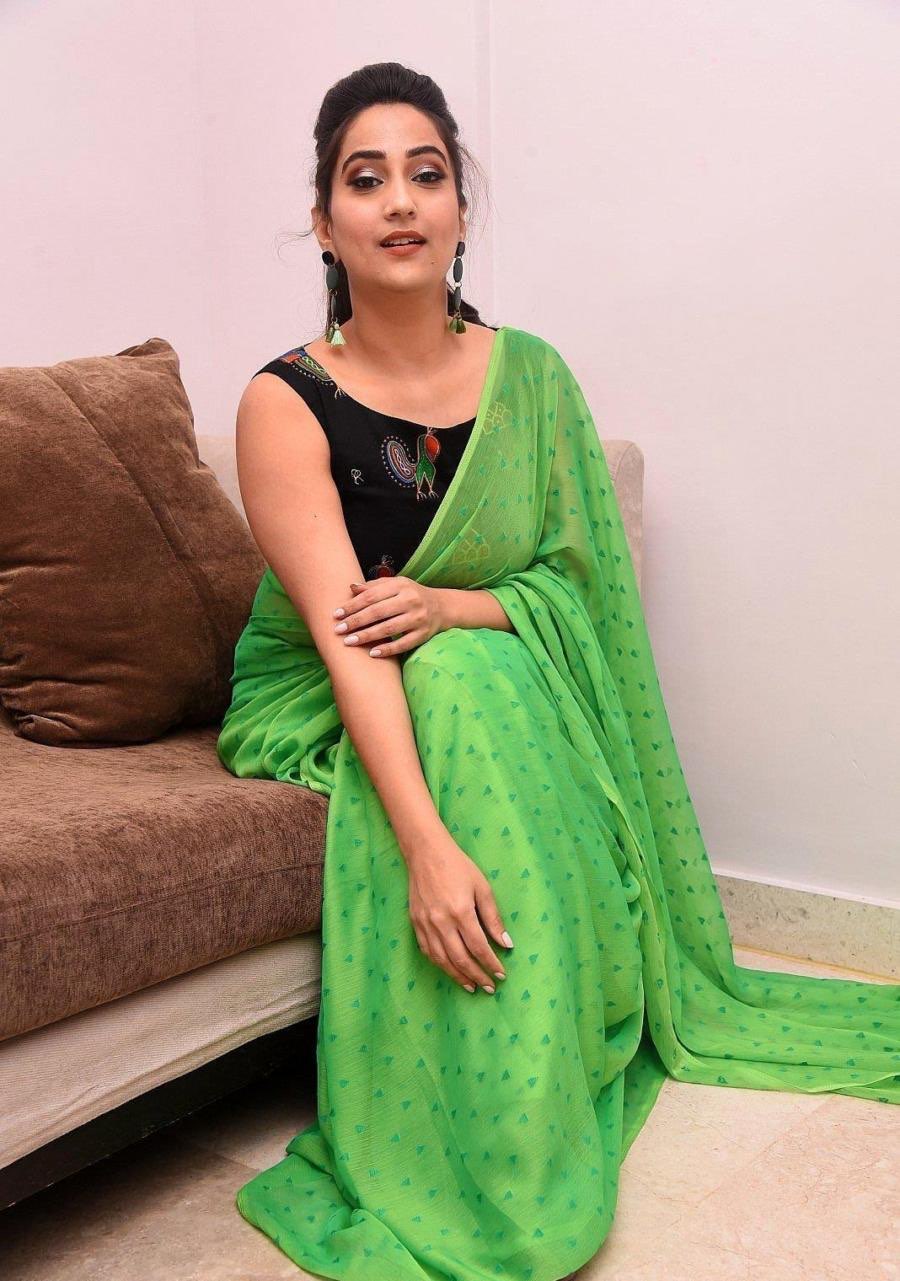 Indian Television Anchor Manjusha In Sleeveless Green Saree