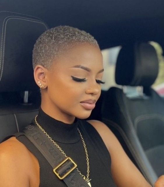 a beautiful lady rocking a blonde short haircut