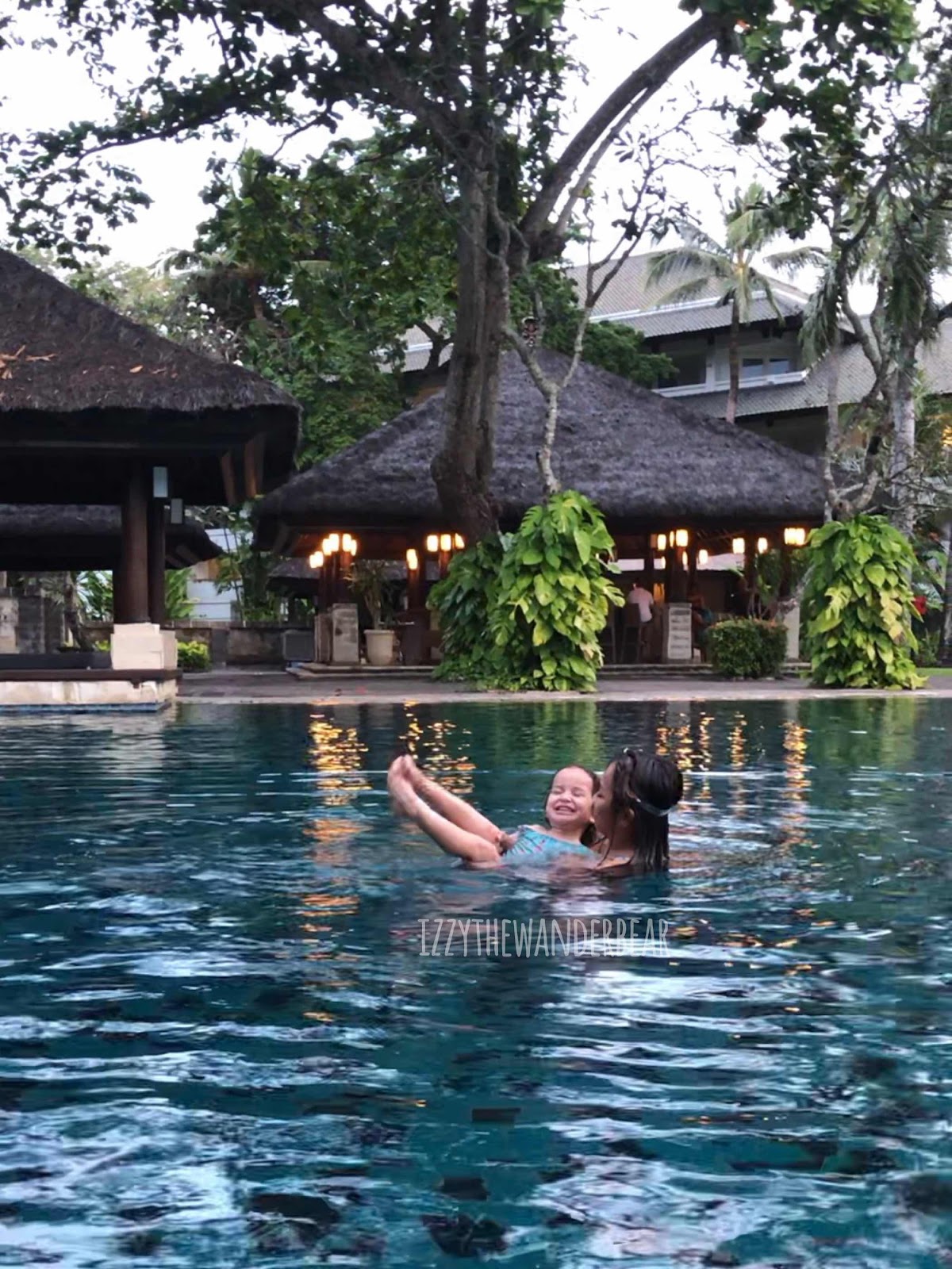 Swimming at Intercontinental Bali Resort Beach Club