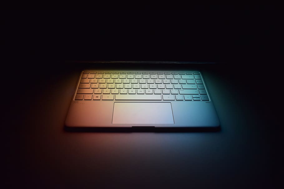 HP Laptop in the colorful shade of lights.