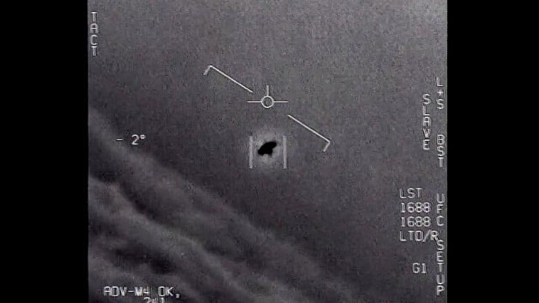 A grainy image of an unidentified aerial phenomenon is seen.