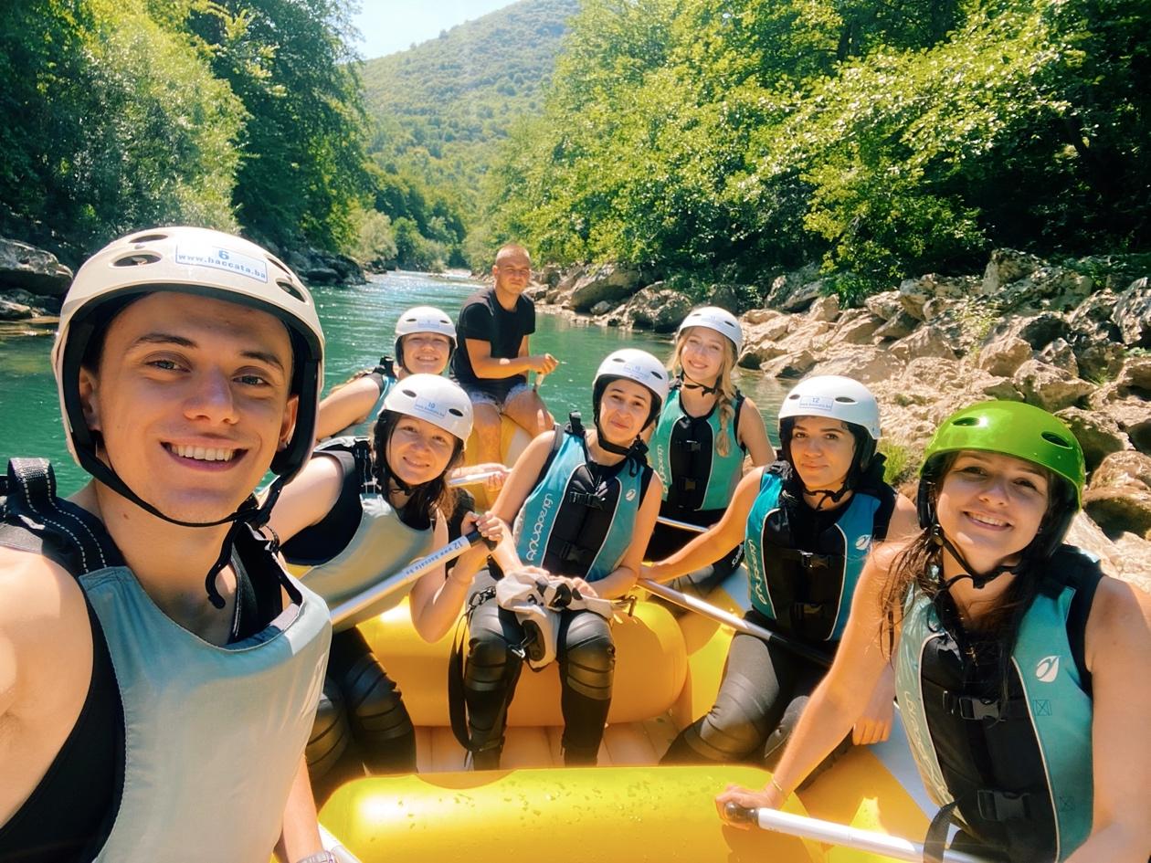 A group of people in a raft

Description automatically generated with medium confidence