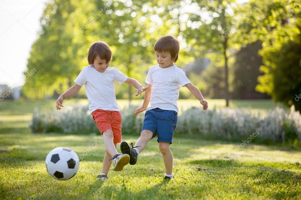 C:\Users\Admin\Downloads\depositphotos_112559546-stock-photo-two-cute-little-kids-playing.jpg