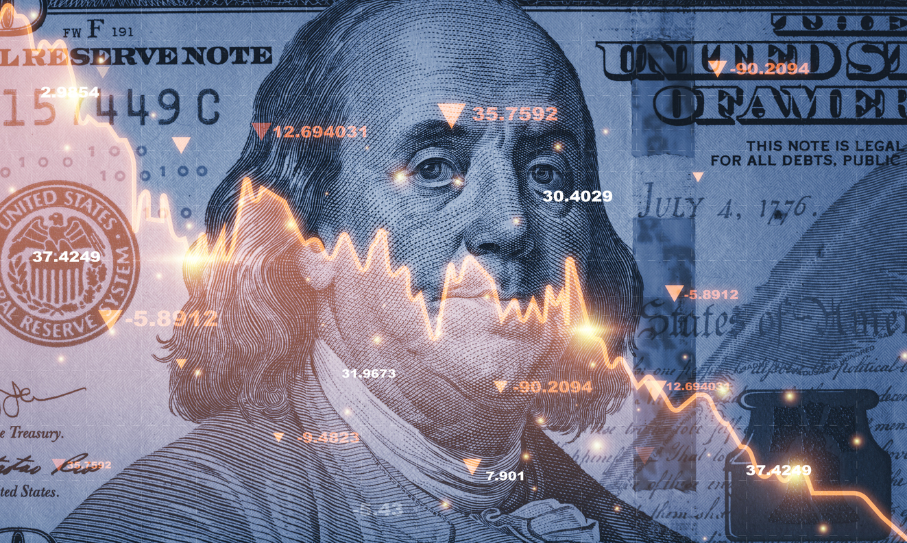 imagem mostra uma nota de dolar e índices financeiros negativos