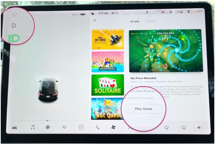 Drivers can now play video games in a moving Tesla, raising safety concerns 1