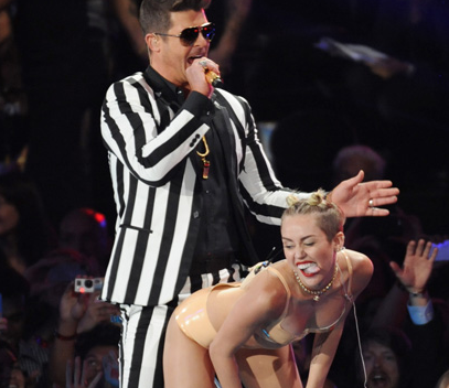 c0 Miley Cyrus performing at the 2013 MTV awards.