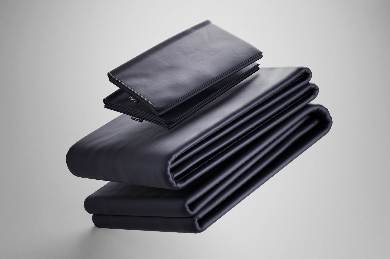 A product photo of a set of folded Hush Sheets.