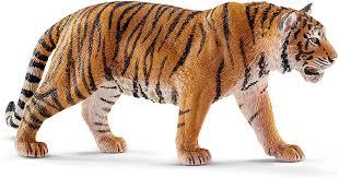 A tiger walking on a white background

Description automatically generated with medium confidence