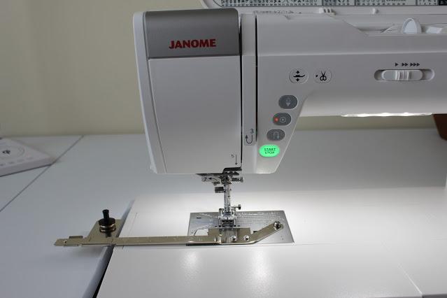 A picture containing sewing machine, appliance, indoor

Description automatically generated
