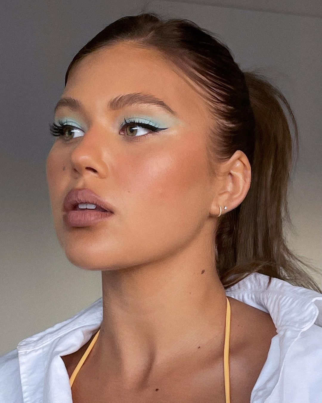 Pastel Blue Eyeshadow with Winged Eyeliner