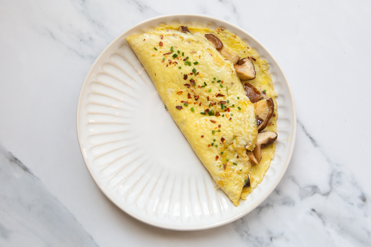 shiitake mushroom omelette served on a plate
