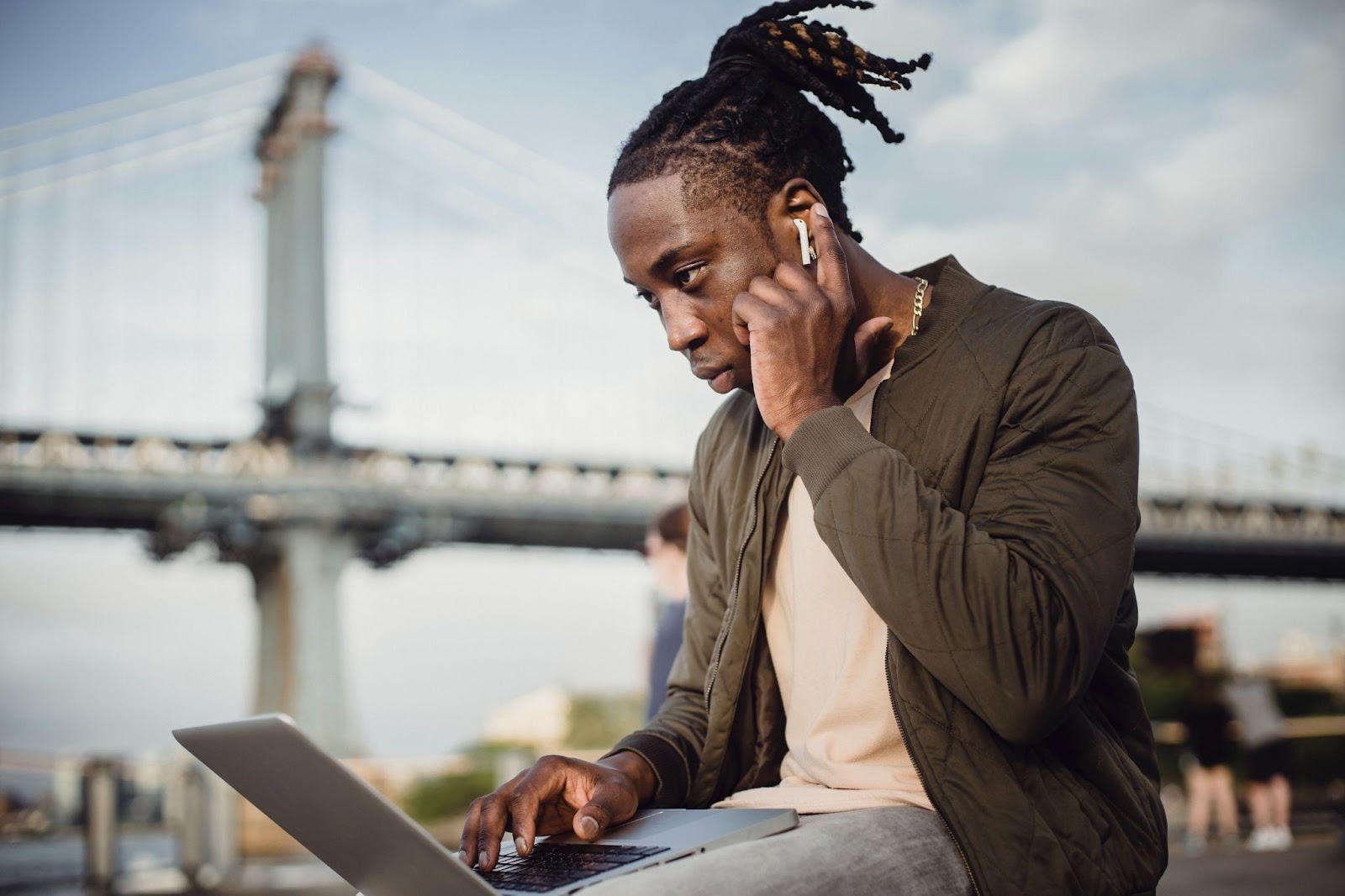 man listening to music on his pc