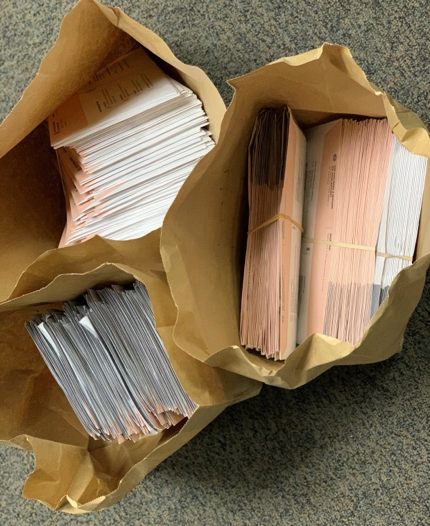 Photograph of several hundred California Recall Election absentee ballots found in the felon’s car.