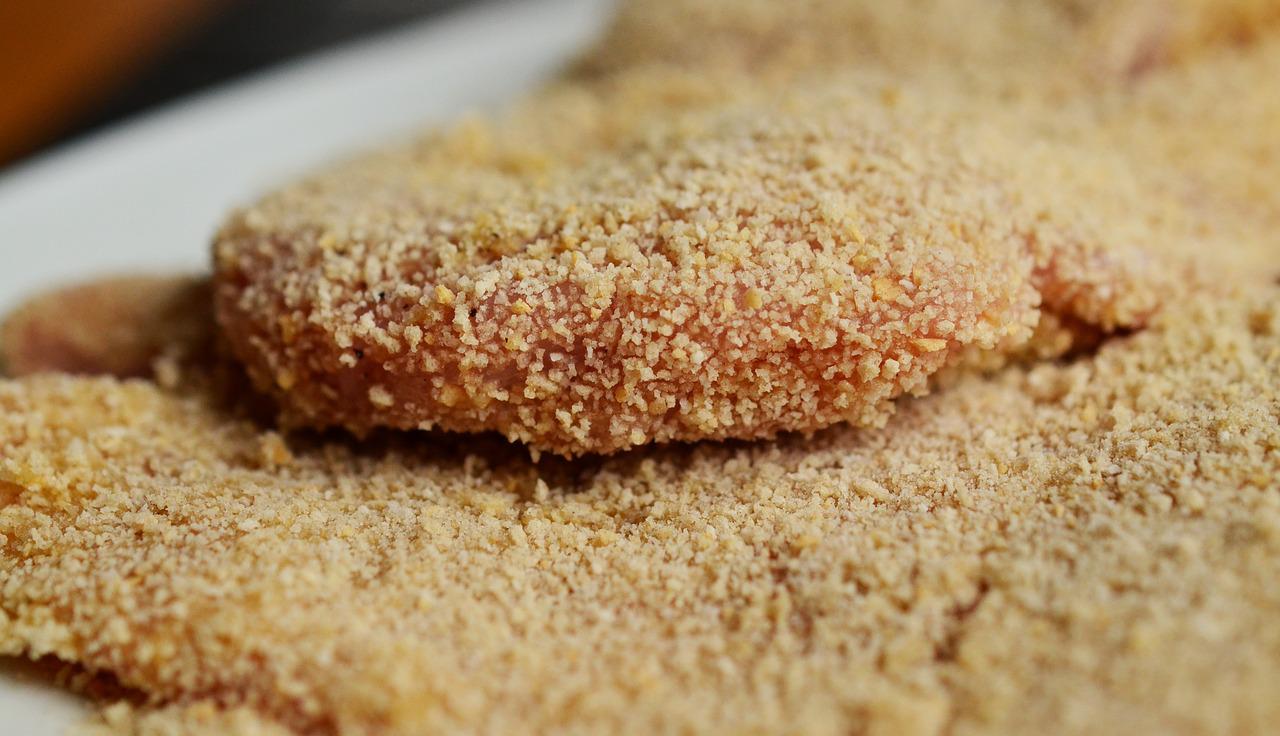 Breadcrumbs and other food crumbs left inside the air fryer burn and smoke. Moreover, they circulate around the air fryer and block the heat from circulating evenly.