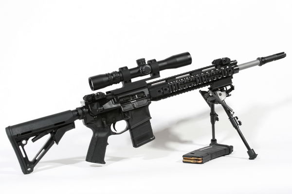 AR15 with aftermarket upgrades on a white background