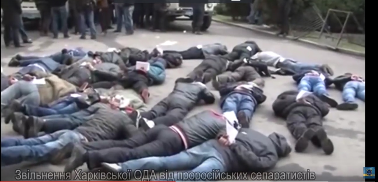 Freeing the Kharkiv Oblast Council from separatists. (Photo: snapshot from the video released by the GPO) ~