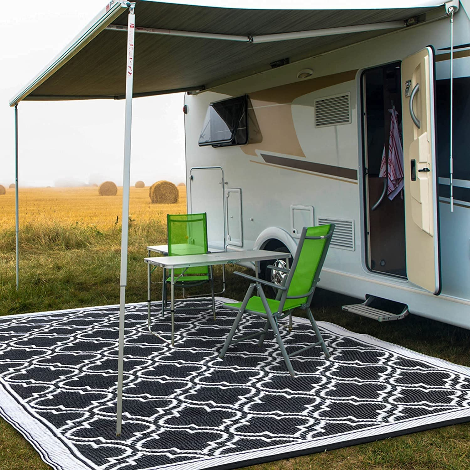 RV mat in use outside of a caravan