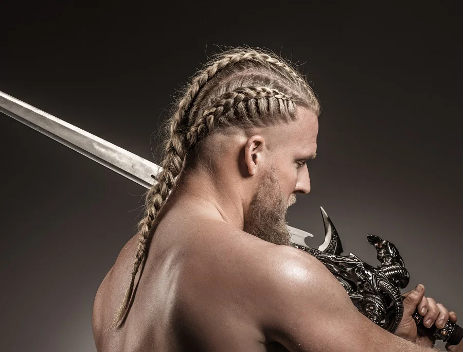 Back view of a guy rocking the viking braids with blades