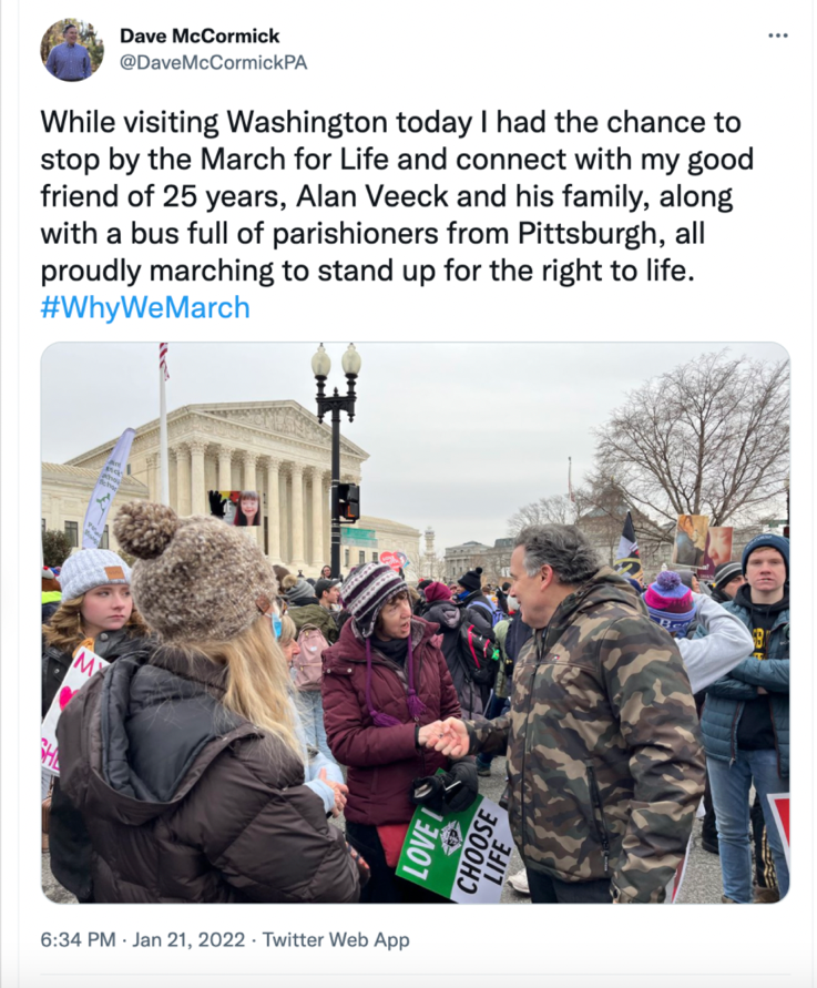 A group of people standing outside  Description automatically generated with low confidence