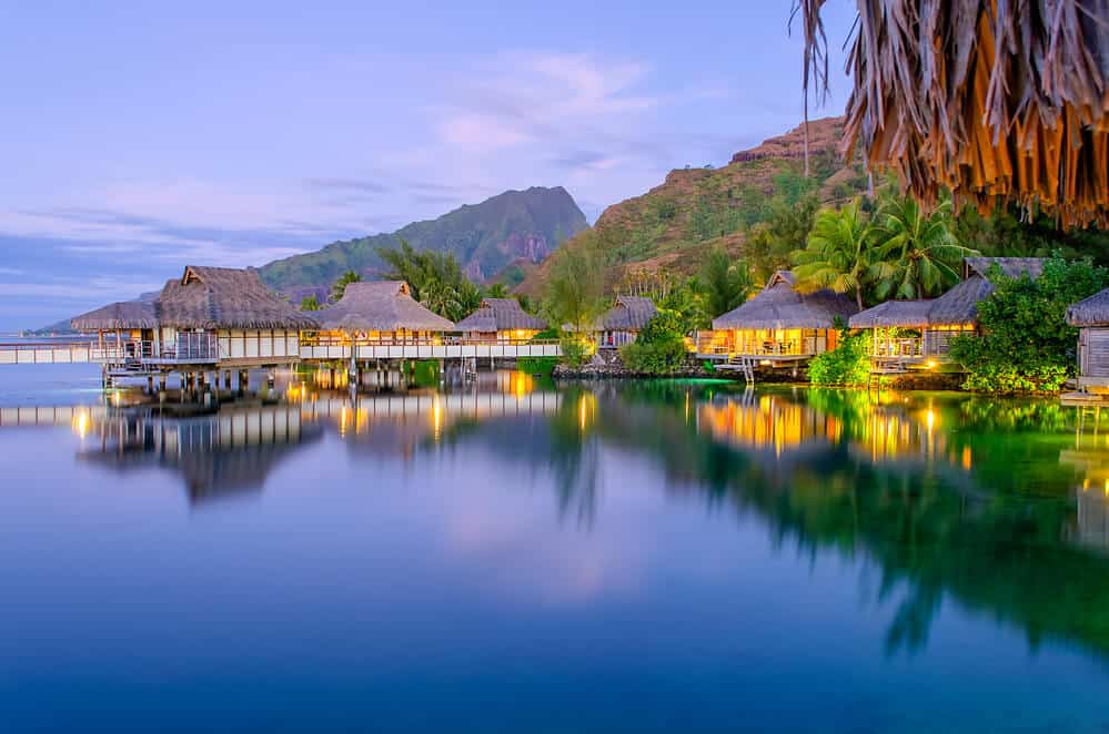 evening view of overwater bungalows