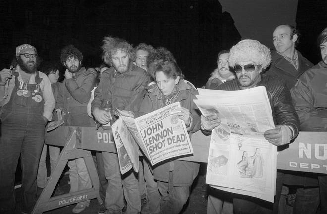 Crowds outside the Dakota react to the news of John Lennon`s death on 9 December 1980
