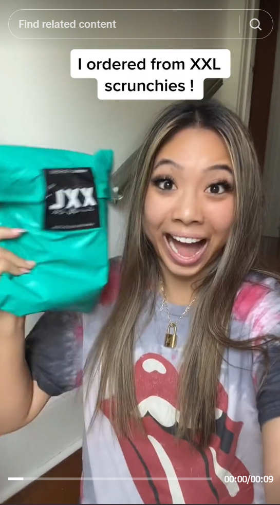 A screenshot of a social media post from a woman showing a package. Some text saying "I ordered from XXL scrunchies"