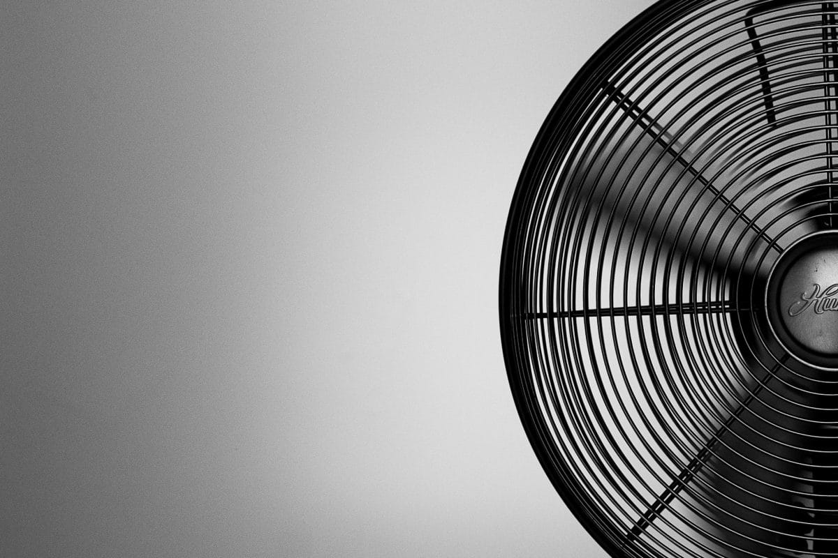 Black and white image of a fan using slow shutter speed in a still life image