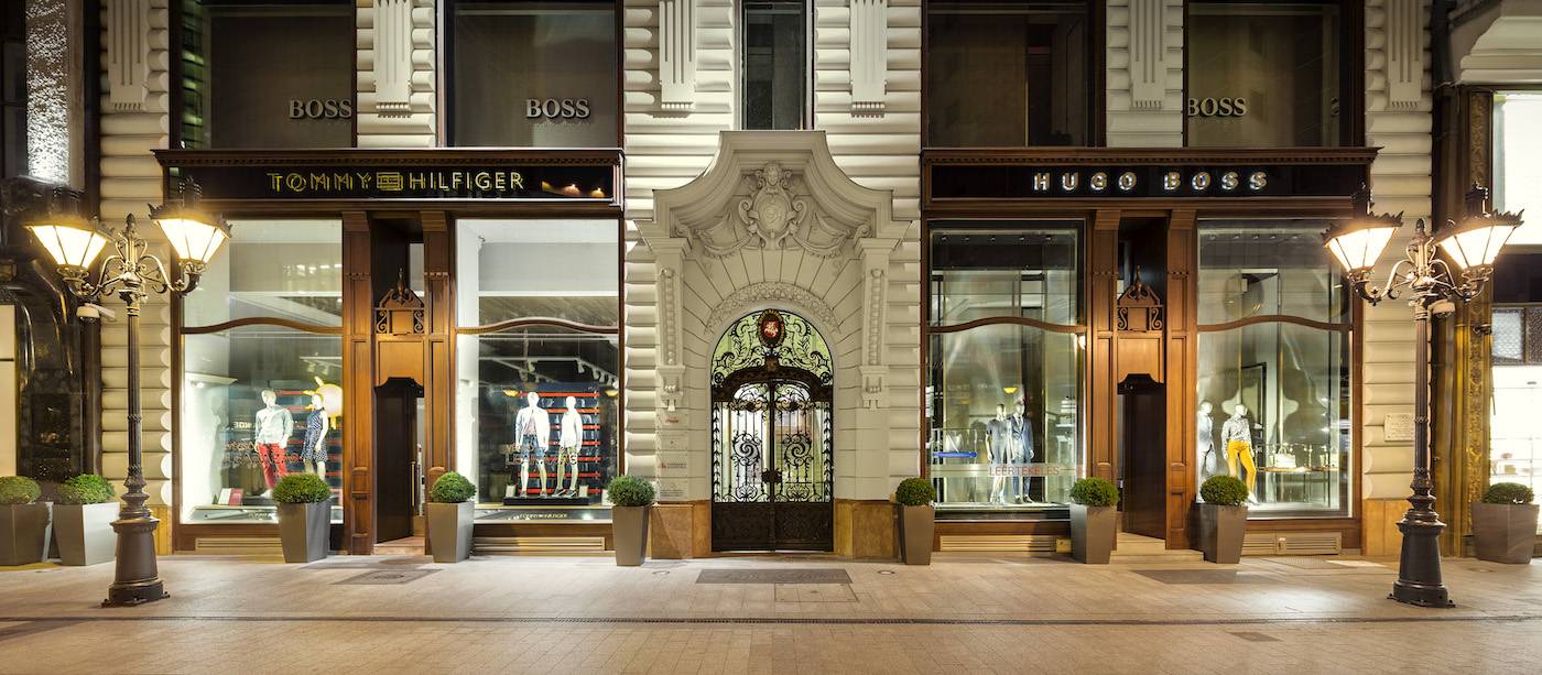 Rustic architecture enclosing modern fashion shops create the unique atmosphere of Budapest's Fashion Street