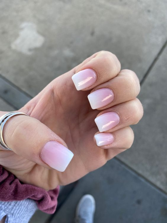Another look at a lady's gorgeous ombre pink and white nails