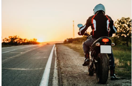 How Do Motorcycle Accidents Result in Burn Injuries?, Cantor Grana Buckner Bucci, a motorcyclist on the side of a highway