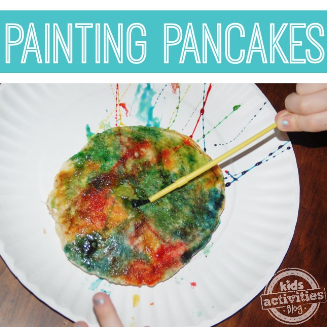 Red, blue, yellow, green pancake on a paper plate- Painting Pancakes - fun from Kids Activities Blog