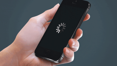 Smartphone loading website with spinning wheel on screen 